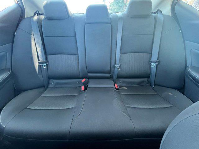 Photo of 2024 Garnet Pearl Metallic Nissan Altima