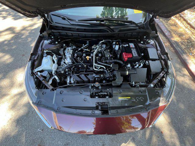 Photo of 2024 Garnet Pearl Metallic Nissan Altima
