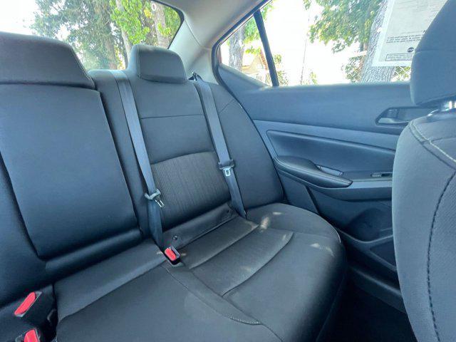 Photo of 2024 Garnet Pearl Metallic Nissan Altima