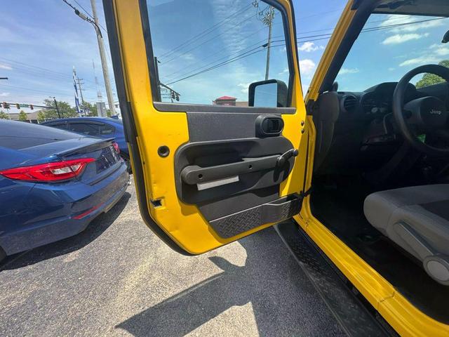 Photo of 2008 Yellow Jeep Wrangler