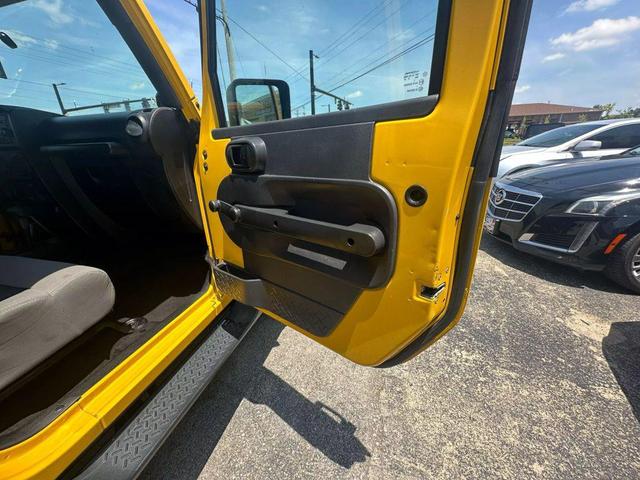 Photo of 2008 Yellow Jeep Wrangler