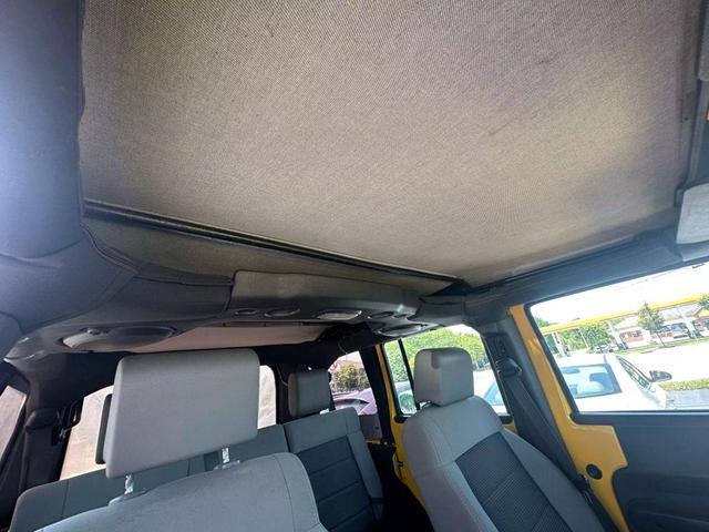 Photo of 2008 Yellow Jeep Wrangler