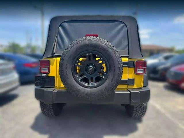 Photo of 2008 Yellow Jeep Wrangler