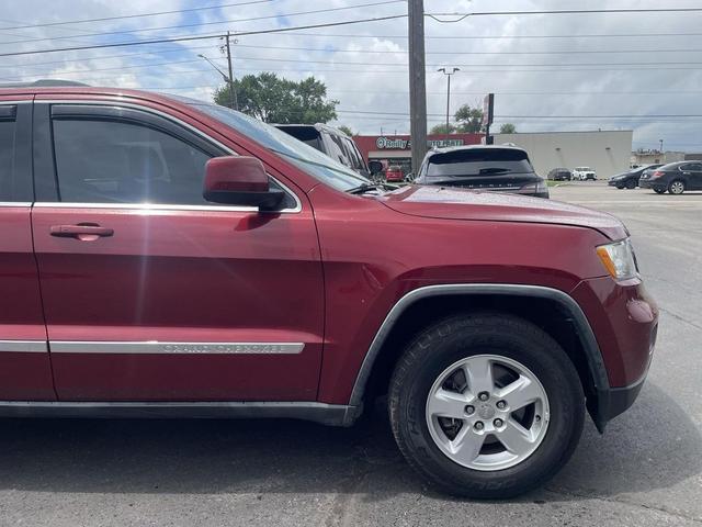 Photo of 2012 Deep Cherry Red Crystal Pearlcoat Jeep Grand Cherokee