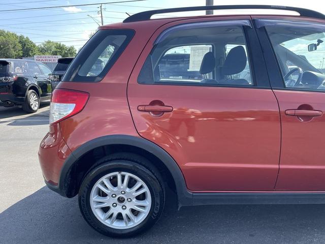 Photo of 2013 Sunlight Copper Metallic Suzuki SX4