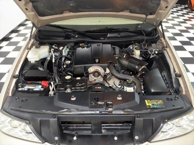 Photo of 2004 LIGHT FRENCH SILK Lincoln Town Car