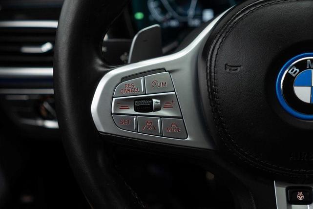 Photo of 2022 Black Sapphire Metallic BMW 745e