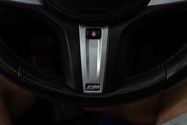 Photo of 2022 Black Sapphire Metallic BMW 745e