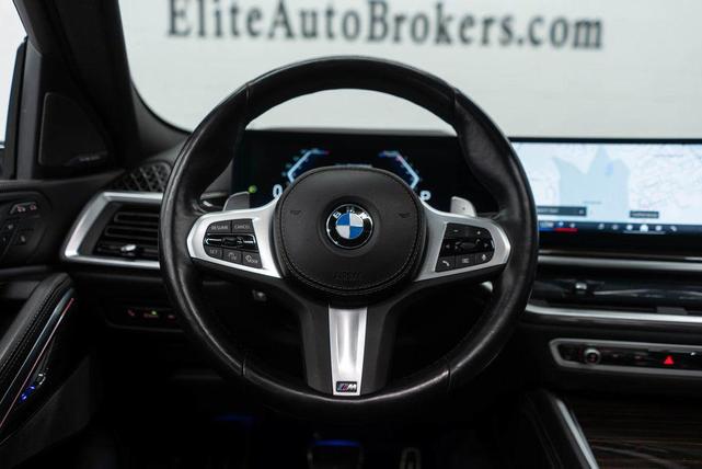 Photo of 2024 Carbon Black Metallic BMW X6