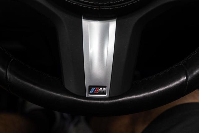 Photo of 2024 Carbon Black Metallic BMW X6