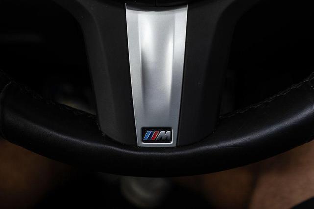 Photo of 2025 Black Sapphire Metallic BMW X6