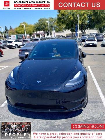 Photo of 2024 Deep Blue Metallic Tesla Model Y