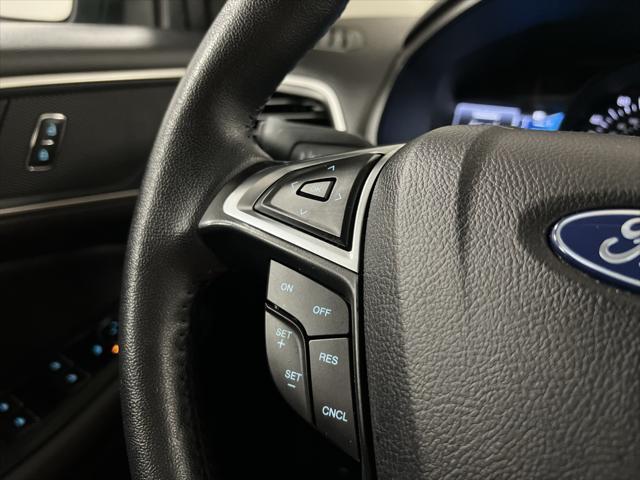 Photo of 2024 Carbonized Gray Metallic Ford Edge