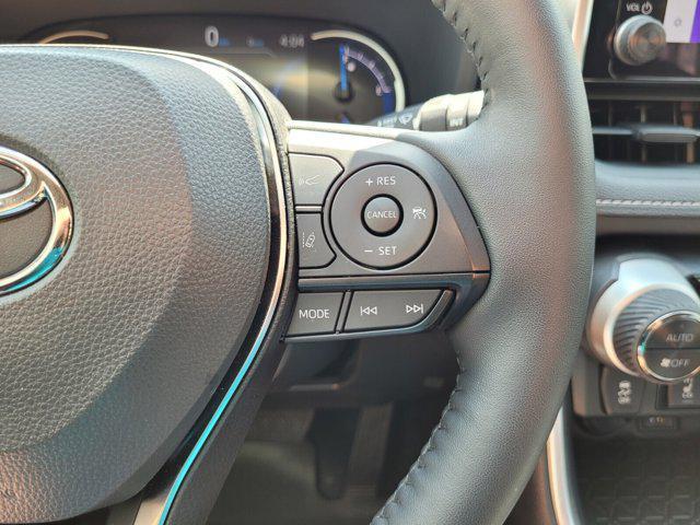 Photo of 2025 Midnight Black Metallic Toyota RAV4 Hybrid