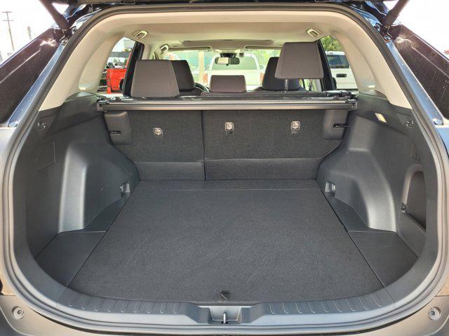 Photo of 2025 Midnight Black Metallic Toyota RAV4 Hybrid
