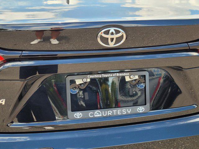 Photo of 2023 Midnight Black Metallic Toyota Corolla