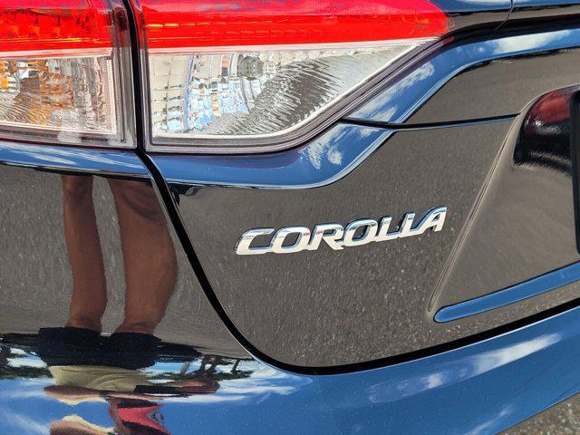Photo of 2023 Midnight Black Metallic Toyota Corolla