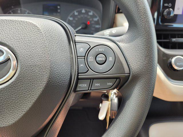 Photo of 2023 Midnight Black Metallic Toyota Corolla