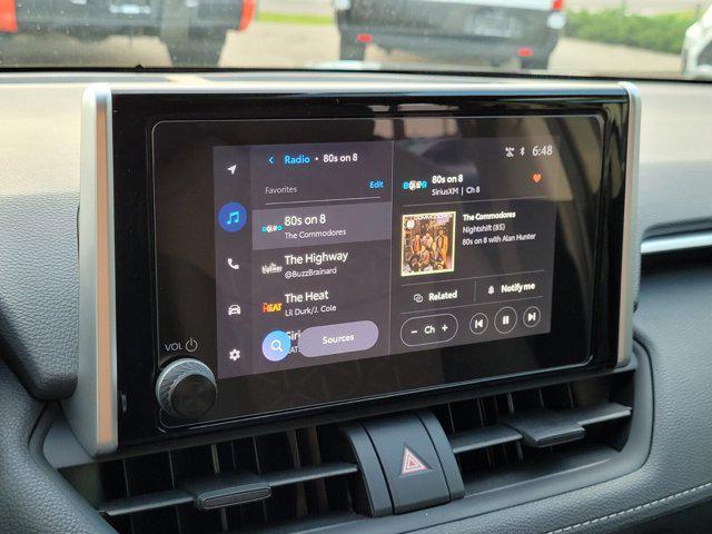 Photo of 2025 Midnight Black Metallic Toyota RAV4 Hybrid