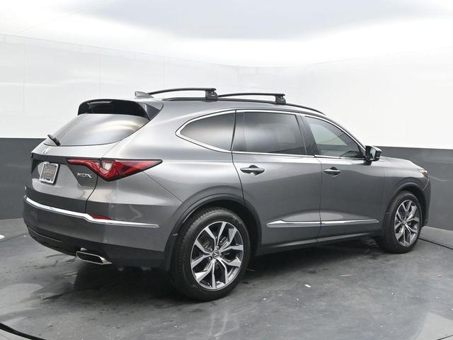 Photo of 2024 Liquid Carbon Metallic Acura MDX