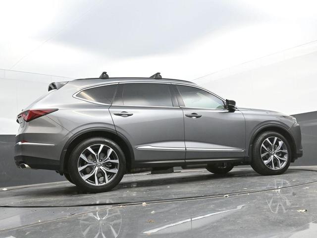 Photo of 2024 Liquid Carbon Metallic Acura MDX
