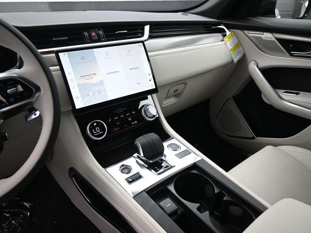 Photo of 2026 Ostuni Pearl White Jaguar F-PACE