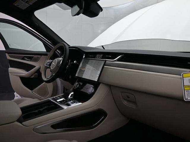 Photo of 2026 Ostuni Pearl White Jaguar F-PACE