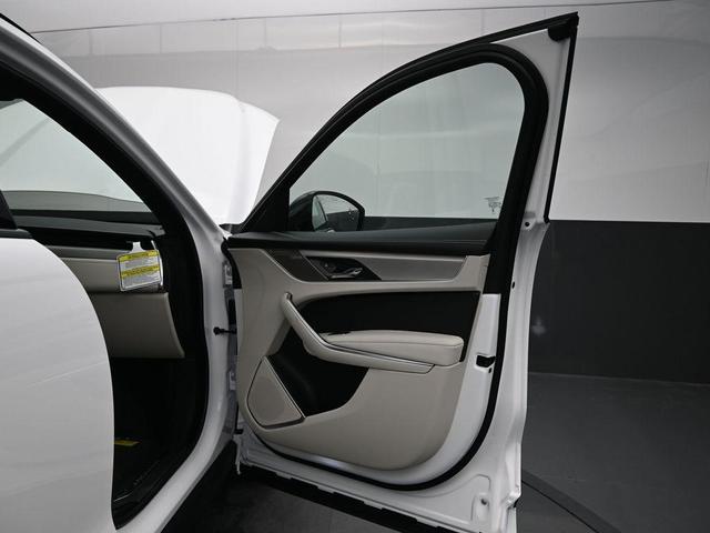 Photo of 2026 Ostuni Pearl White Jaguar F-PACE