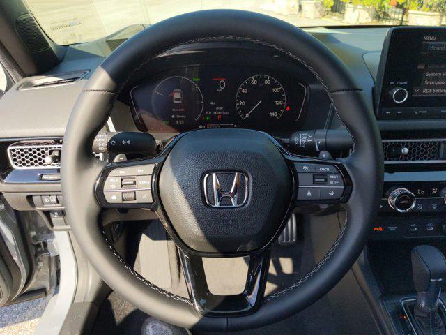 Photo of 2025 Platinum White Honda Civic Hybrid