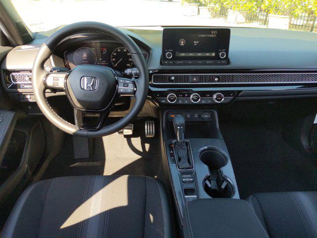 Photo of 2025 Platinum White Honda Civic Hybrid