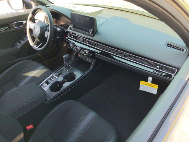 Photo of 2025 Platinum White Honda Civic Hybrid
