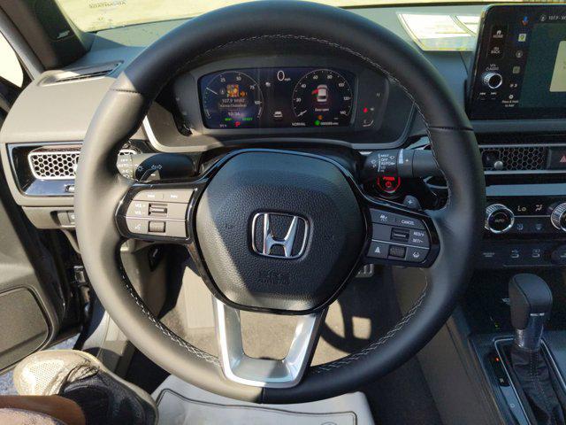 Photo of 2025 Platinum White Honda Civic Hybrid