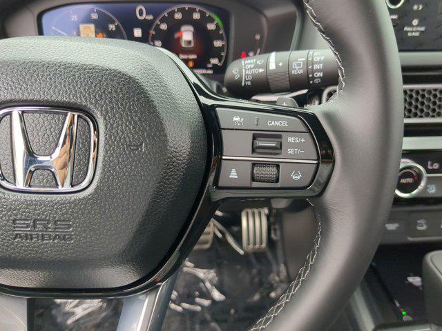 Photo of 2025 Sand Dune Pearl Honda Civic Hybrid