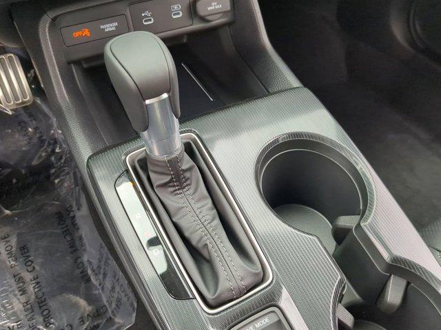 Photo of 2025 Sand Dune Pearl Honda Civic Hybrid