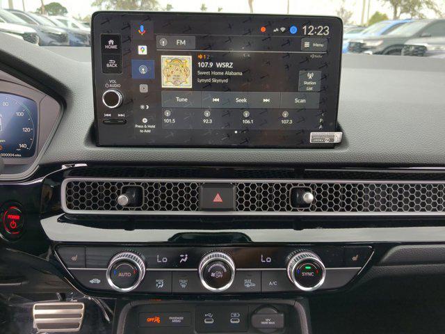 Photo of 2025 Sand Dune Pearl Honda Civic Hybrid