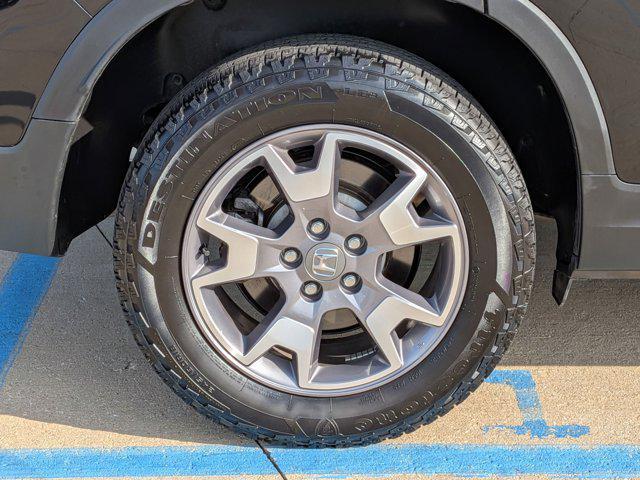 Photo of 2022 Crystal Black Pearl Honda Passport