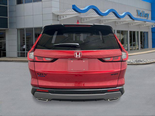 Photo of 2026 Radiant Red Metallic Honda CR-V Hybrid