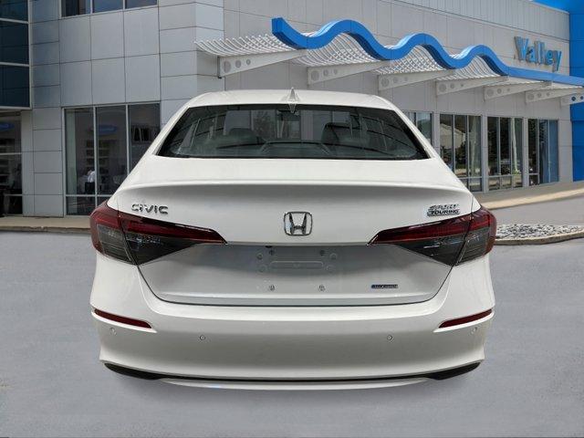 Photo of 2026 Platinum White Pearl Honda Civic Hybrid