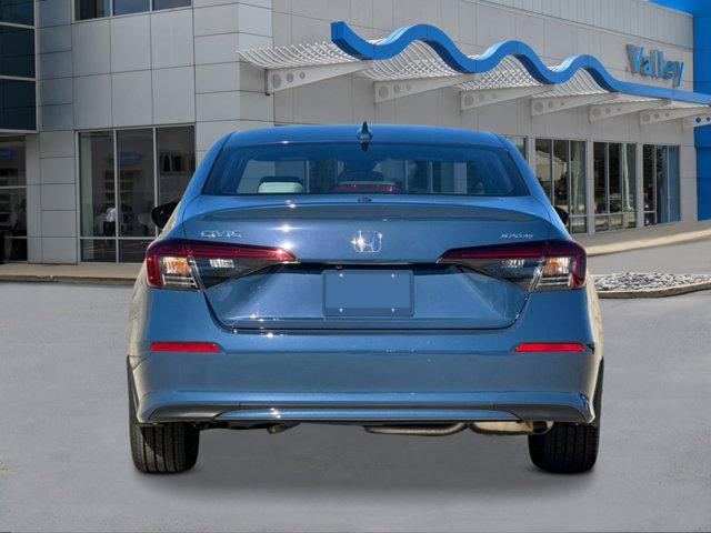 Photo of 2026 Blue Lagoon Pearl Honda Civic Hybrid
