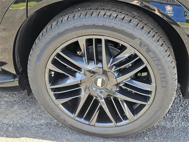 Photo of 2025 Black Raven Cadillac Escalade IQ