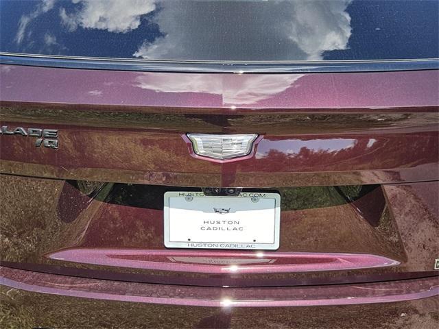 Photo of 2025 Black Cherry Cadillac Escalade IQ