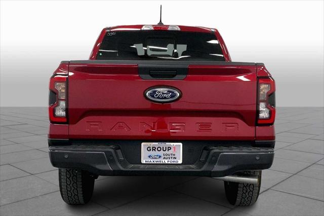 Photo of 2025 Ruby Red Metallic Tinted Clearcoat Ford Ranger