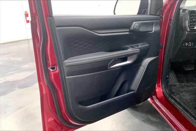 Photo of 2025 Ruby Red Metallic Tinted Clearcoat Ford Ranger