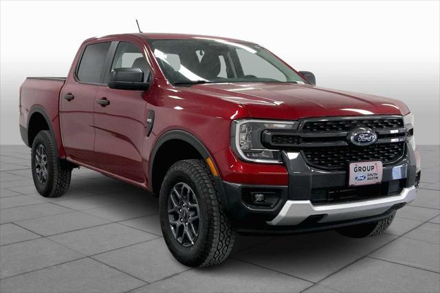 Photo of 2025 Ruby Red Metallic Tinted Clearcoat Ford Ranger