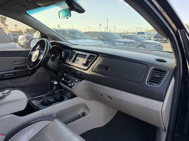 Photo of 2017 Aurora Black Kia Sedona