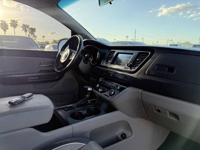 Photo of 2017 Aurora Black Kia Sedona
