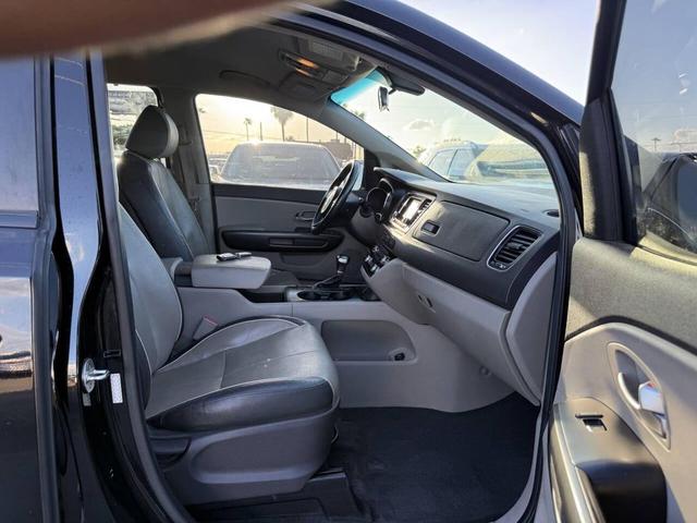 Photo of 2017 Aurora Black Kia Sedona