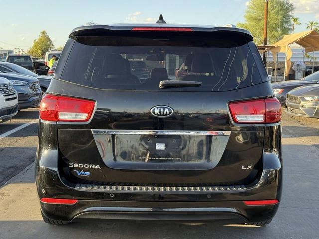 Photo of 2017 Aurora Black Kia Sedona