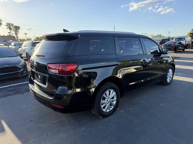 Photo of 2017 Aurora Black Kia Sedona