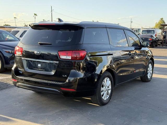 Photo of 2017 Aurora Black Kia Sedona